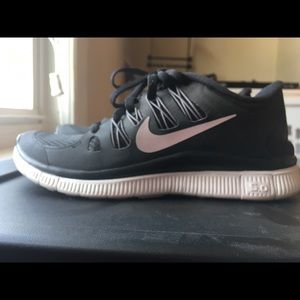 Black Nike running sneakers